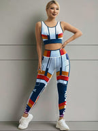 Women's striped sports bra and leggings set in bold print - front view
